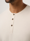 Travis Mathew Cloud Henley Tee in Italian Sand