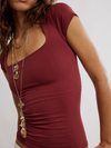 Free People Clean Lines Sunfade Baby Tee in Pomegranate
