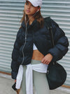 Free People In A Bubble Puffer Jacket in Black